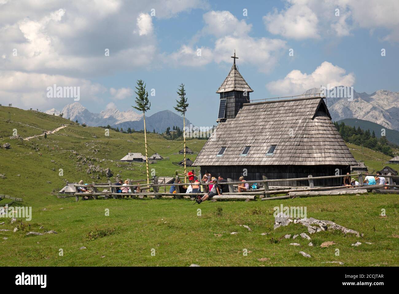 The mountain settlement village of Velika Planina in Slovenia. The village church in the foreground. Stock Photo