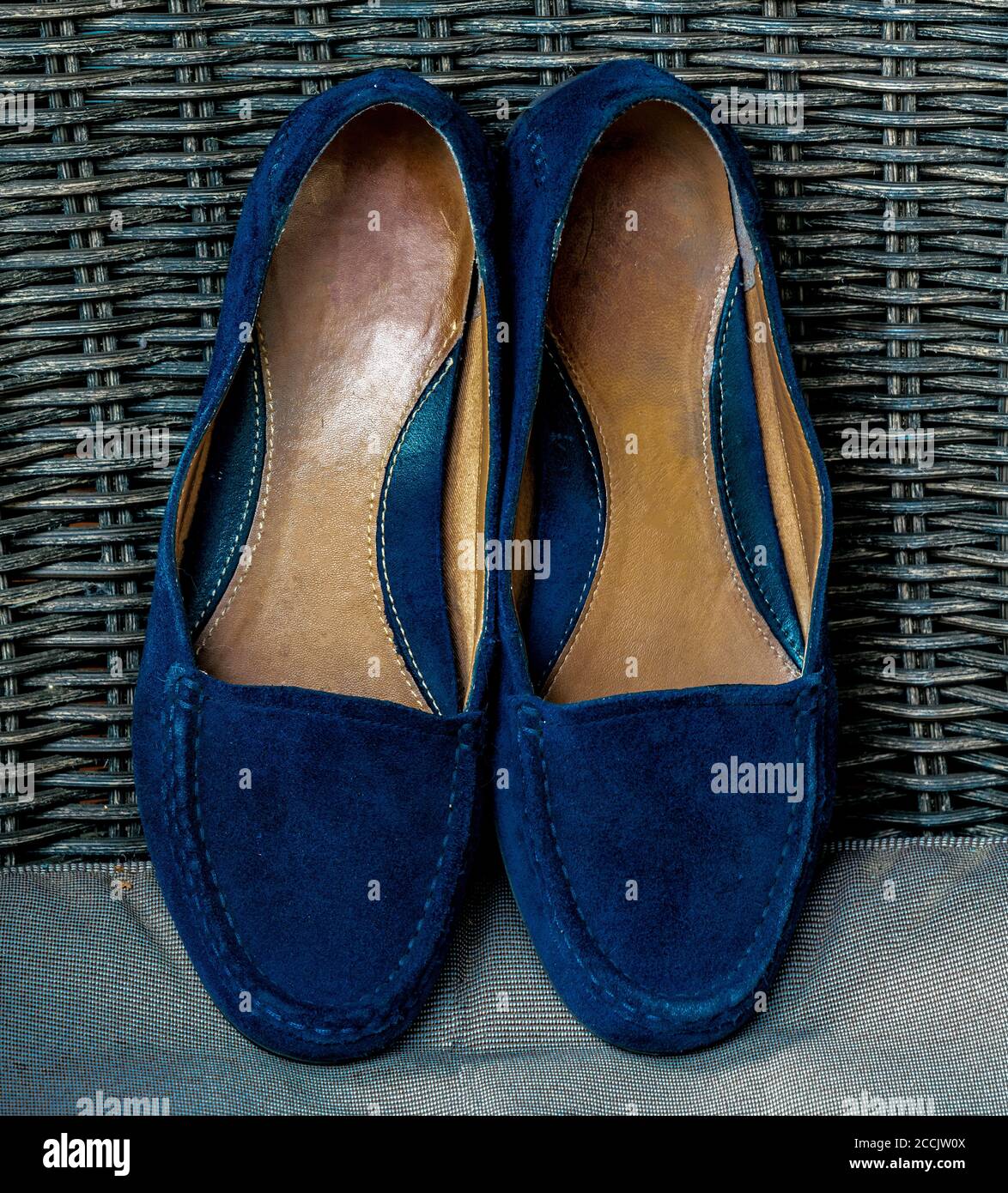 Dark blue suede female slippers Stock Photo