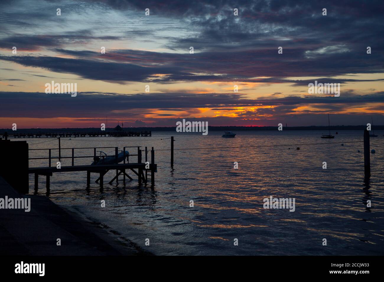 sunset,over sea, pier,seafront,fishing,boats,boat,boating,Yarmouth