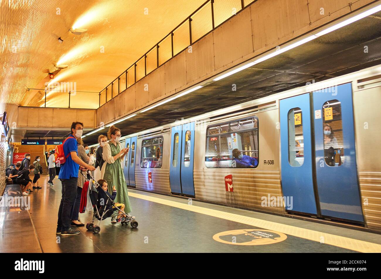 Lisbon, Lissabon, Portugal, 16rd August 2020.  Underground train with passengers and a corona sign with advice to keep distance. © Peter Schatz / Alam Stock Photo