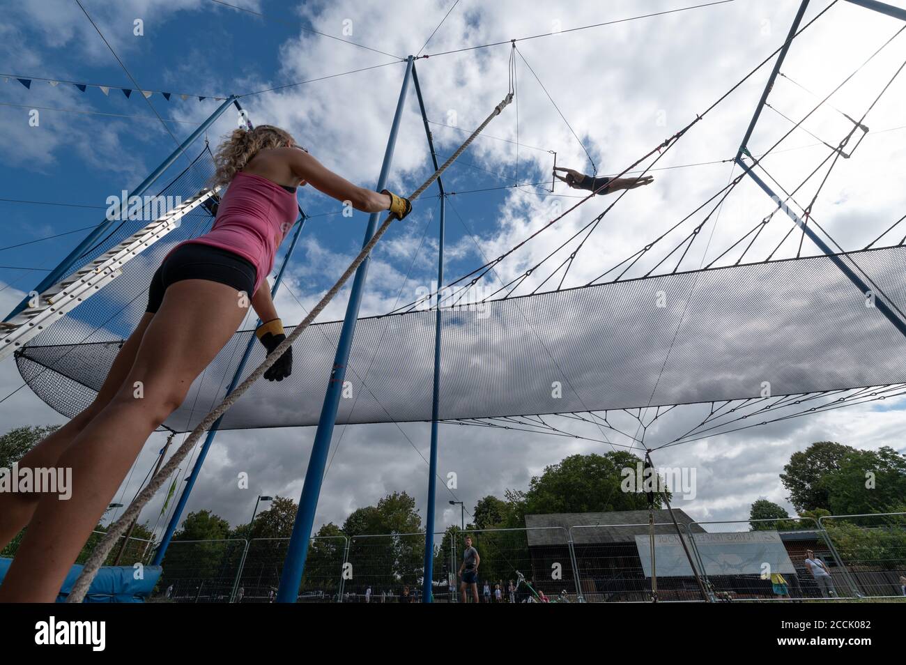 Oxford, UK. 23rd Aug, 2020. Flying trapeze lessons with High Fly Trapeze in Florence Park on a bright Sunday morning. Credit: Andrew Walmsley/Alamy Live News Stock Photo