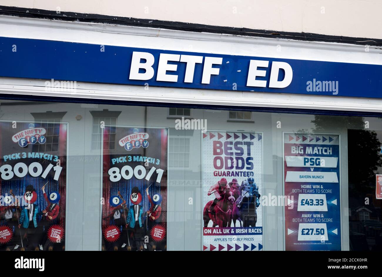 Missing letter on Betfred bookmakers shop sign, Warwick, UK Stock Photo