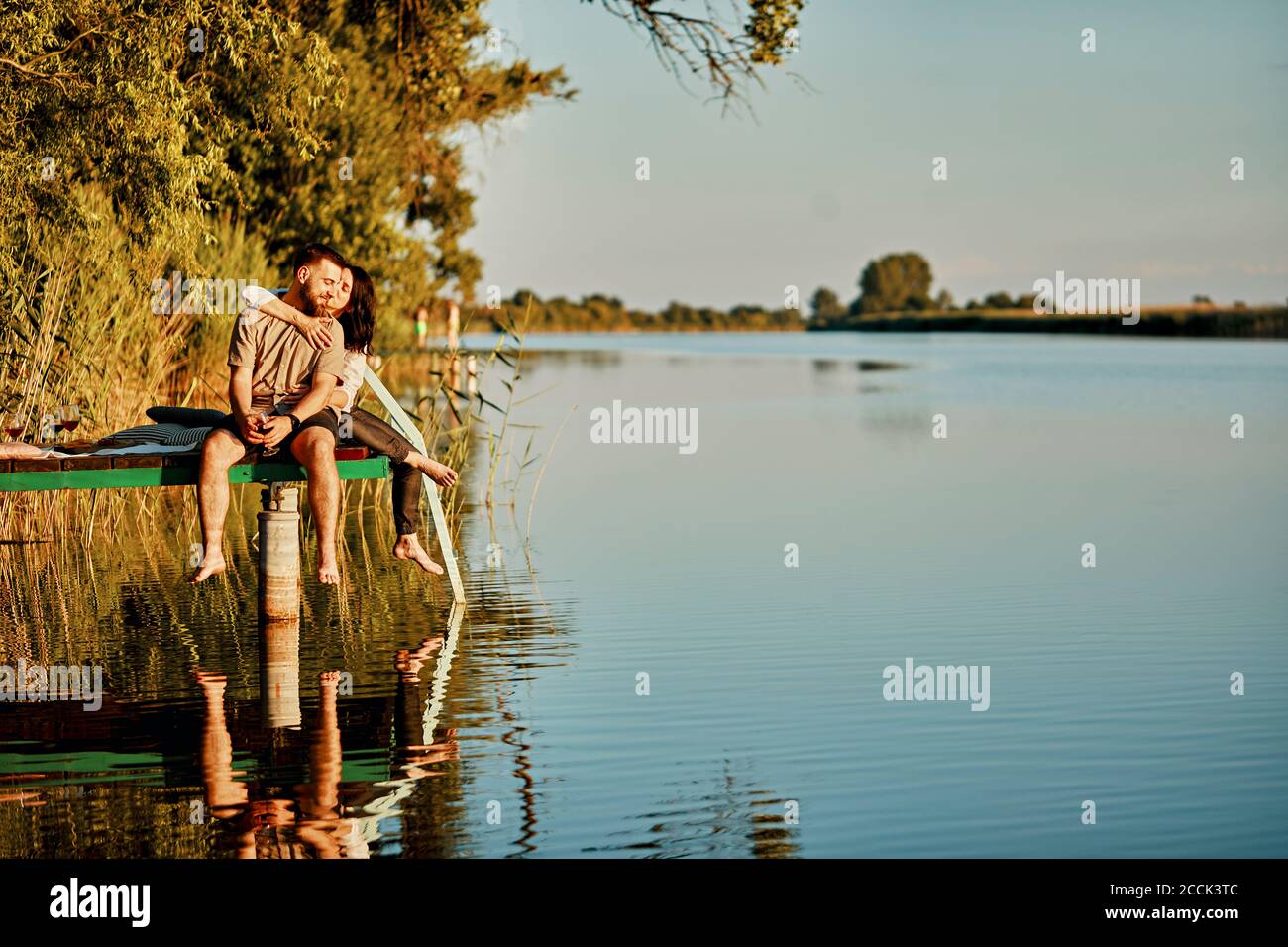 Couple kissing in lake hi-res stock photography and images - Alamy