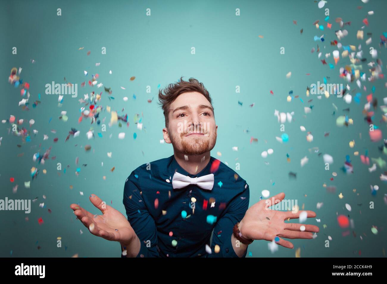 Man throwing confetti hires stock photography and images Alamy