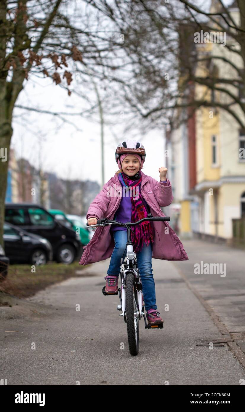 Girl on bicycle helmet hires stock photography and images Alamy