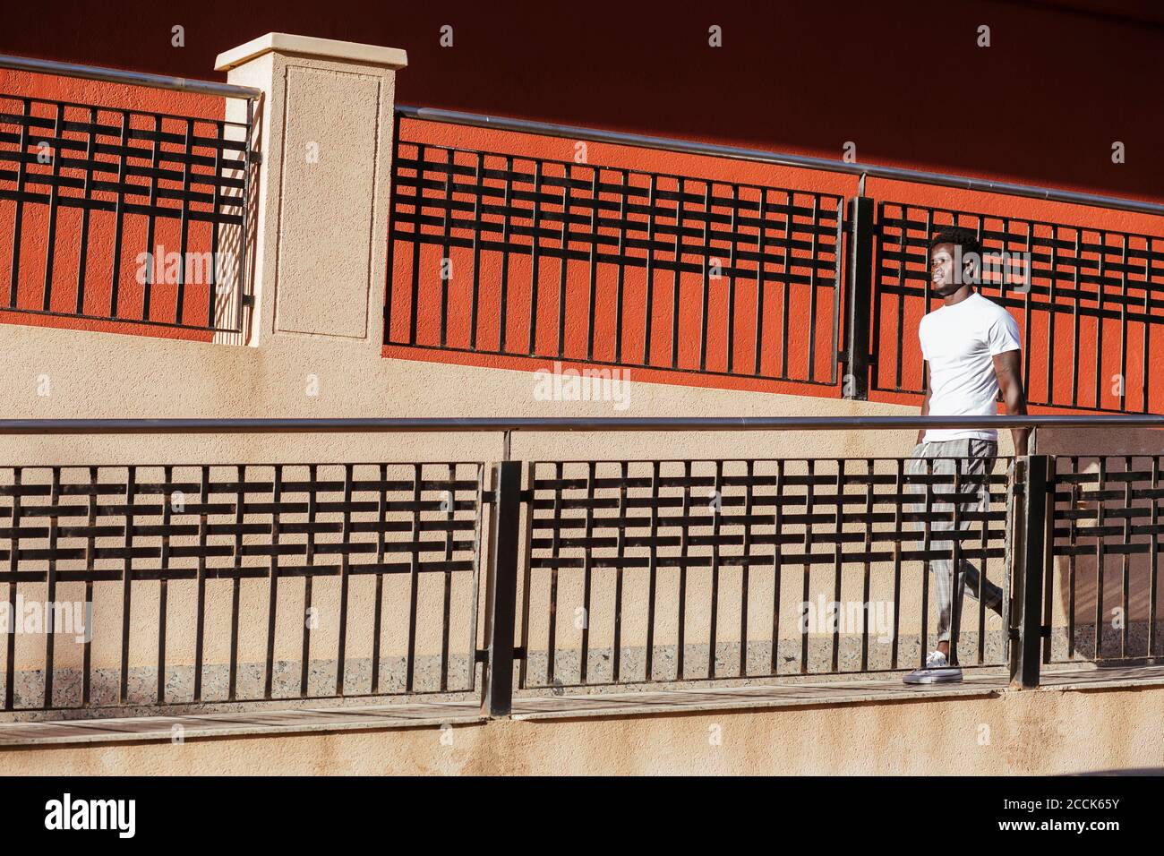 Attractive young man walking in hi-res stock photography and images - Alamy