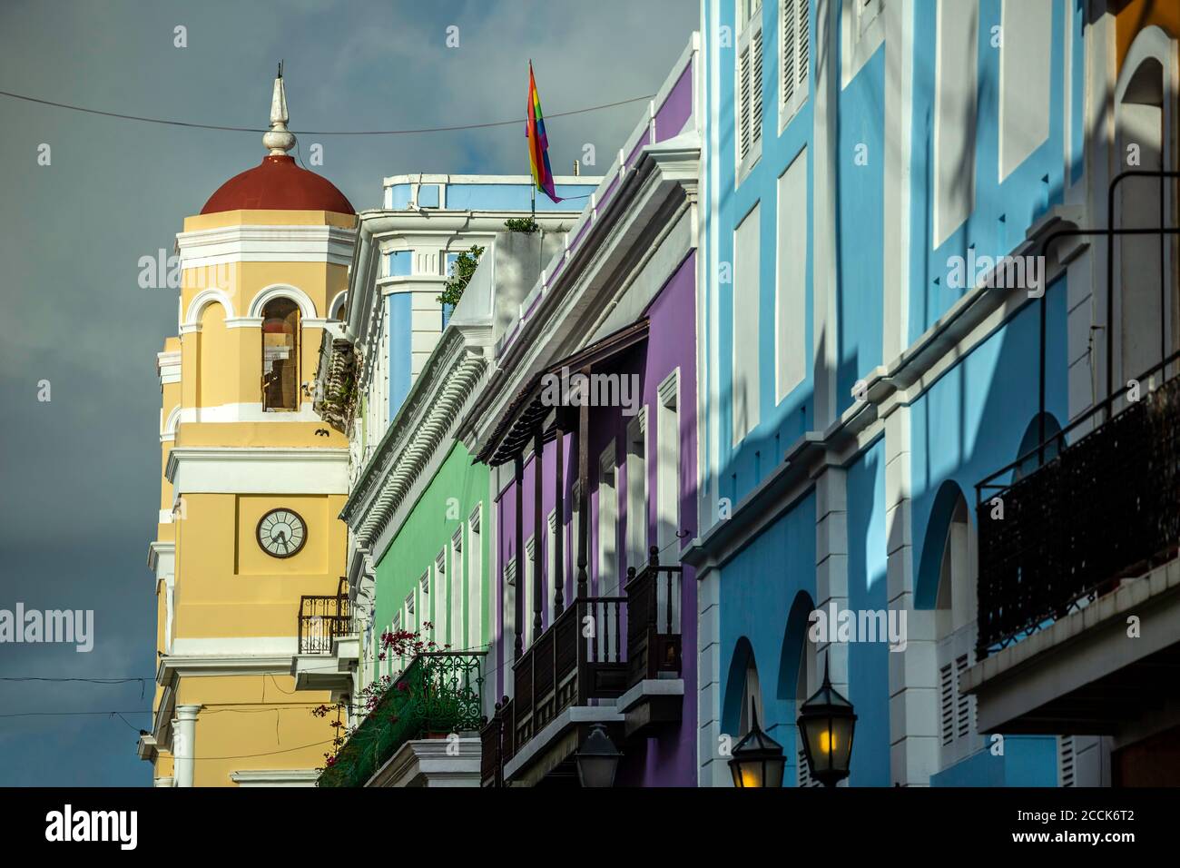City Hall bell tower and colorful Spanish Colonial buildings, San Francisco St., Old San Juan, Puerto Rico Stock Photo