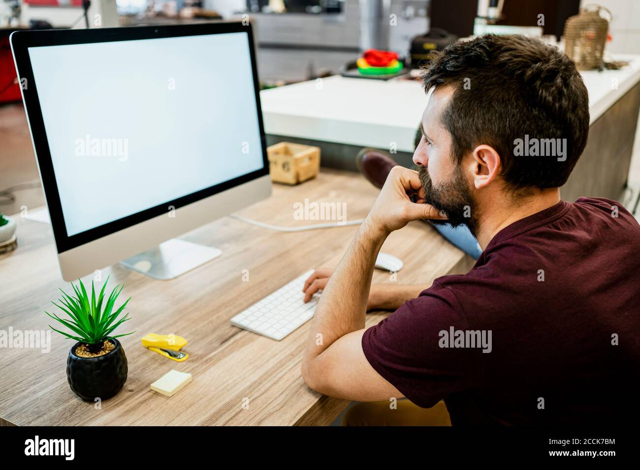 Businessman desktop pc in modern office Stock Photo