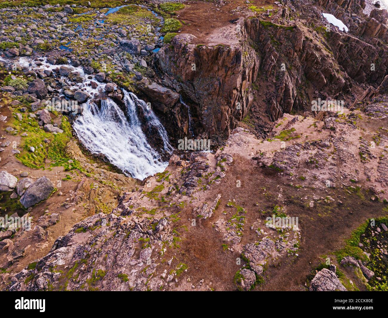 Russia, Murmansk Oblast, Teriberka, Aerial view of coastal waterfall ...