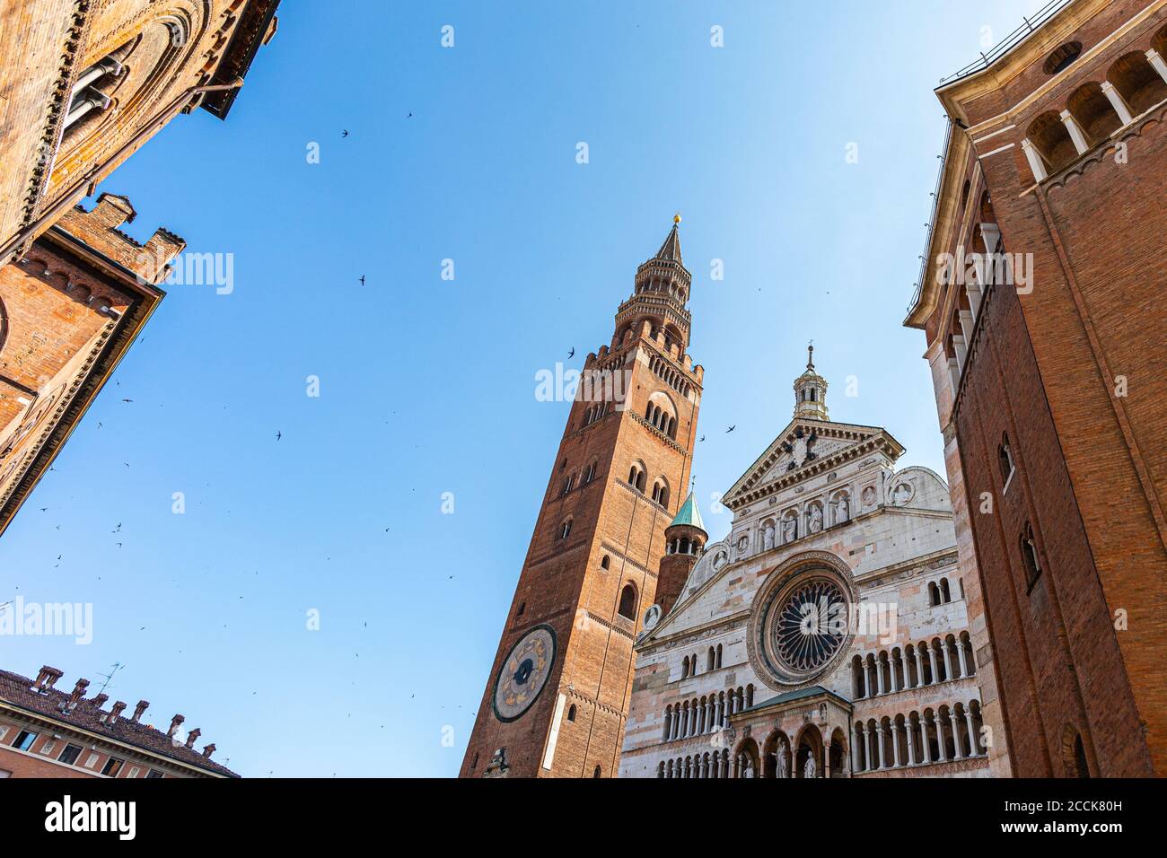 Italy, Province of Cremona, Cremona, Clear sky over Cremona Baptistery and Torrazzo bell tower Stock Photo