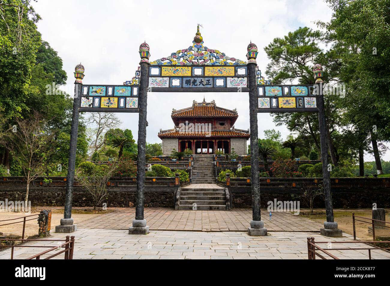 Vietnam, Hue, Minh Mang Tomb with gate in foreground Stock Photo