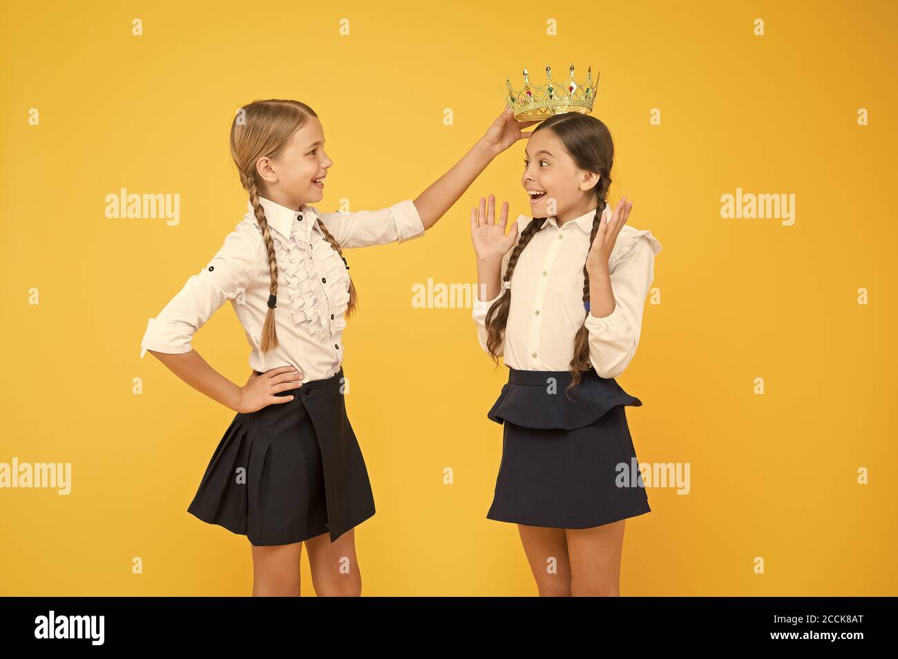 Happy Girls In Uniform And Crown Imagine As Big Boss Motivation To Study Kid Fashion Friendship Prom Queen Childhood Pride Education Success Back To School Selfish Girls Dream About Future Stock Photo Happy Girls In Uniform And Crown Imagine As Big Boss Motivation To Study Kid Fashion Friendship Prom Queen Childhood Pride Education Success Back To School Selfish Girls Dream About Future Stock Photo