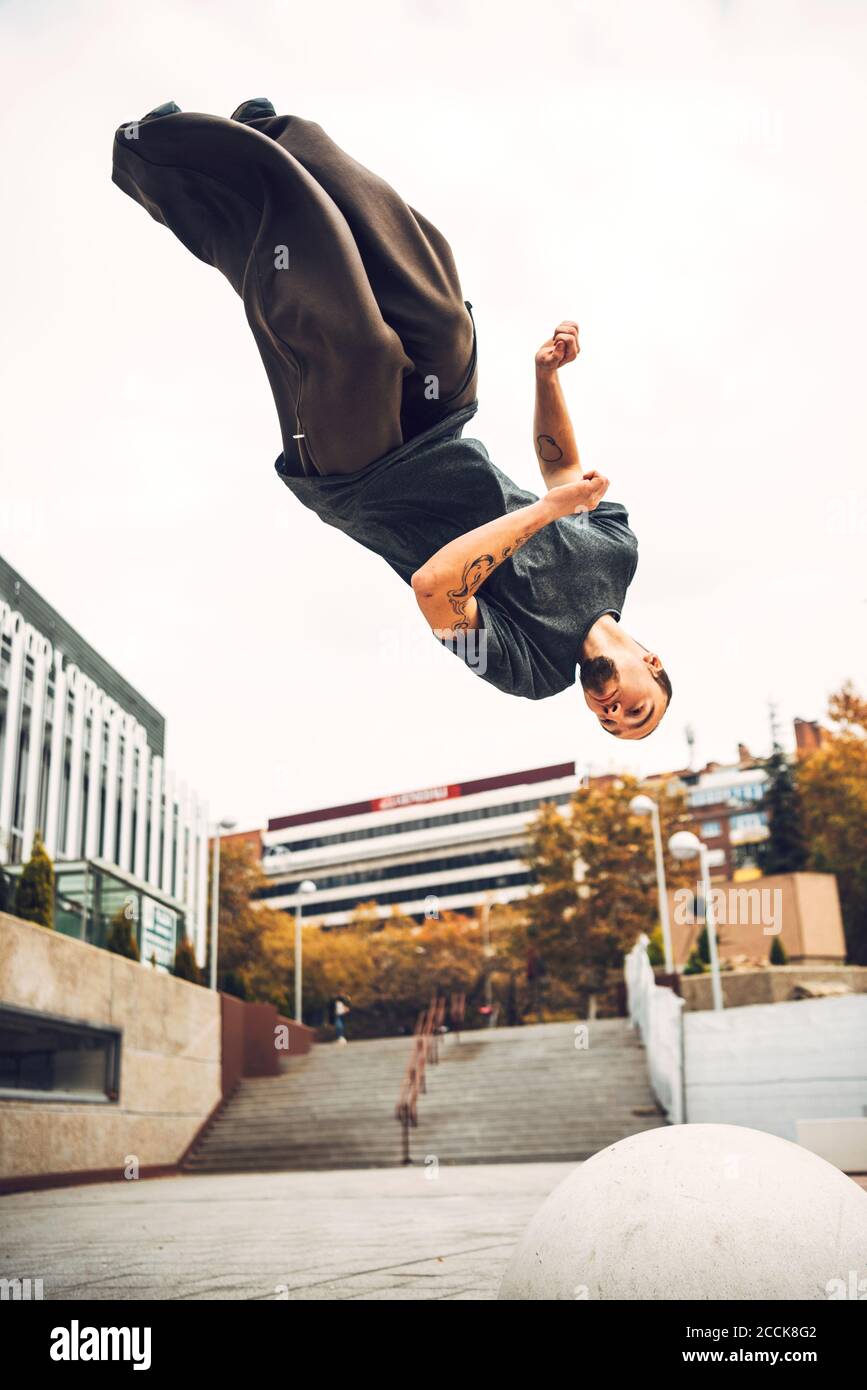 Young man upside down hi-res stock photography and images - Alamy