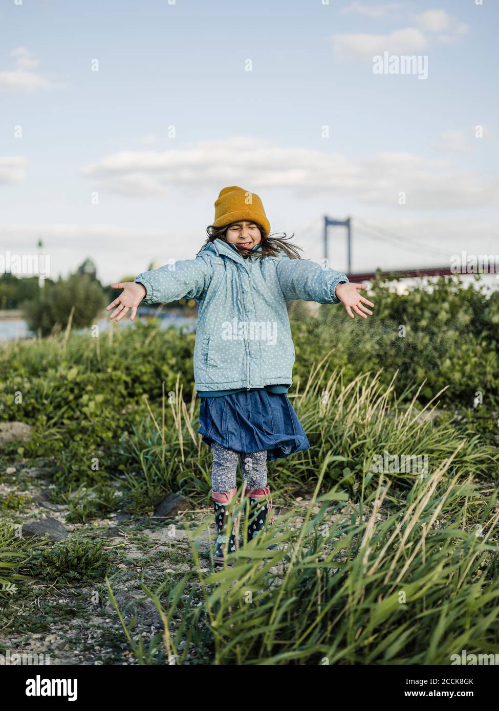 Girl with arms outstretched hi-res stock photography and images - Alamy
