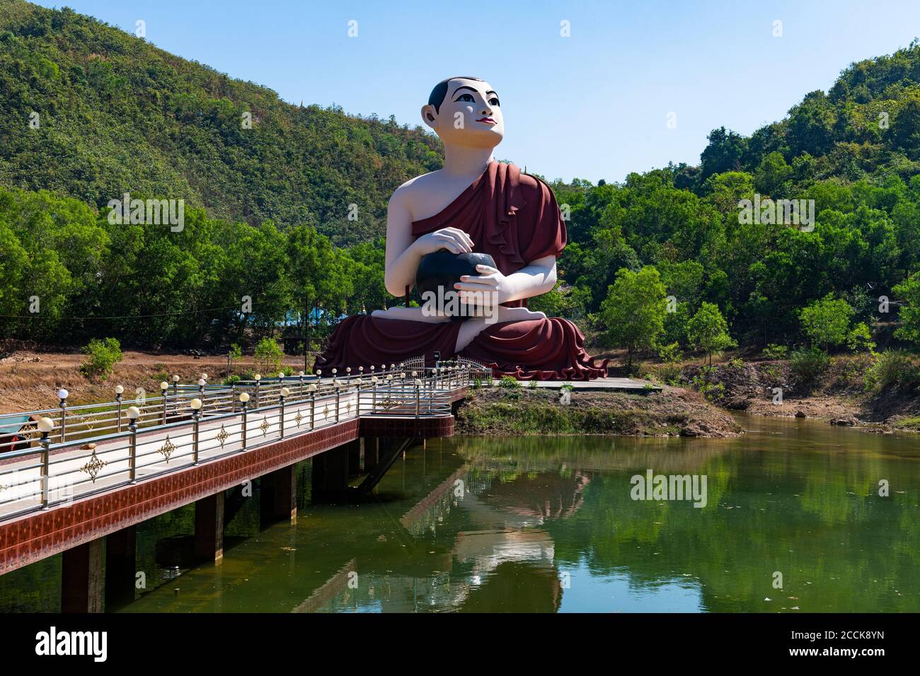 Myanmar, Mon state, outside of Mawlamyine, Statue of Buddhist monk at Win Sein Taw Ya Stock Photo