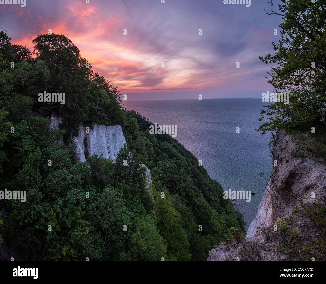 Germany, Mecklenburg-Western Pomerania, Stubbenkammer chalk cliffs at dusk Stock Photo