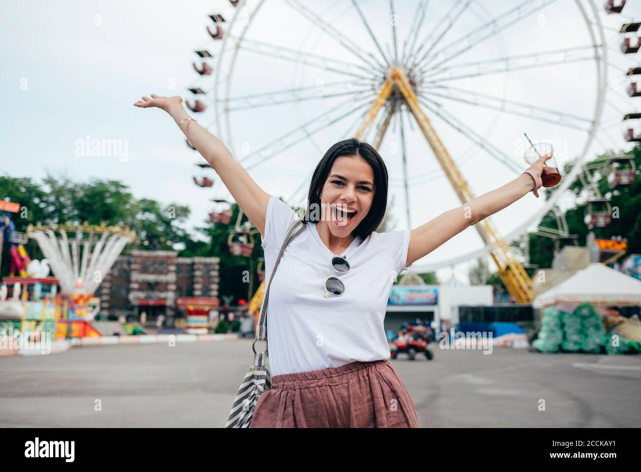 Arms raised fairground hi-res stock photography and images - Alamy