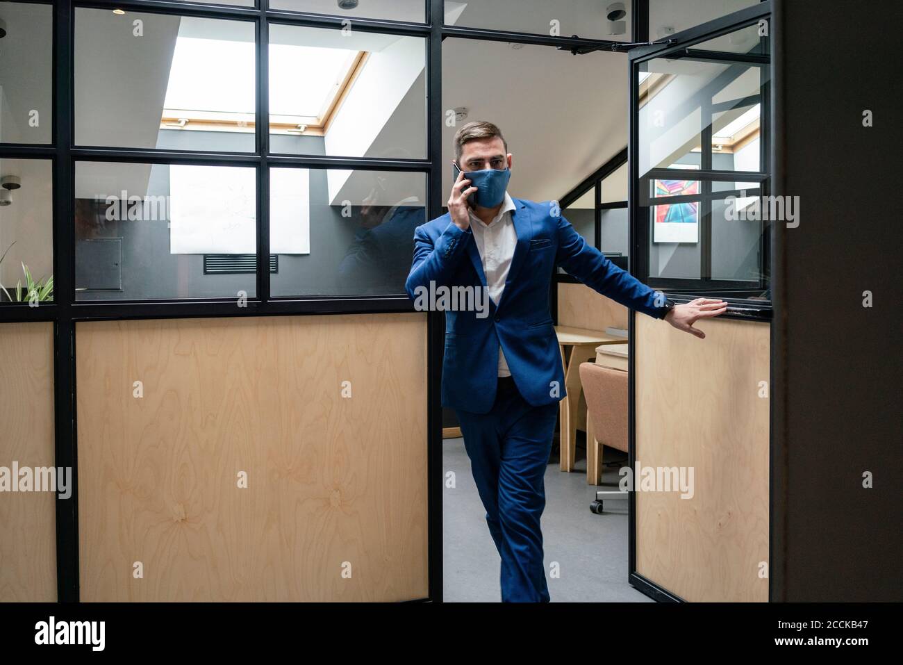 Man walking out door hi-res stock photography and images - Alamy