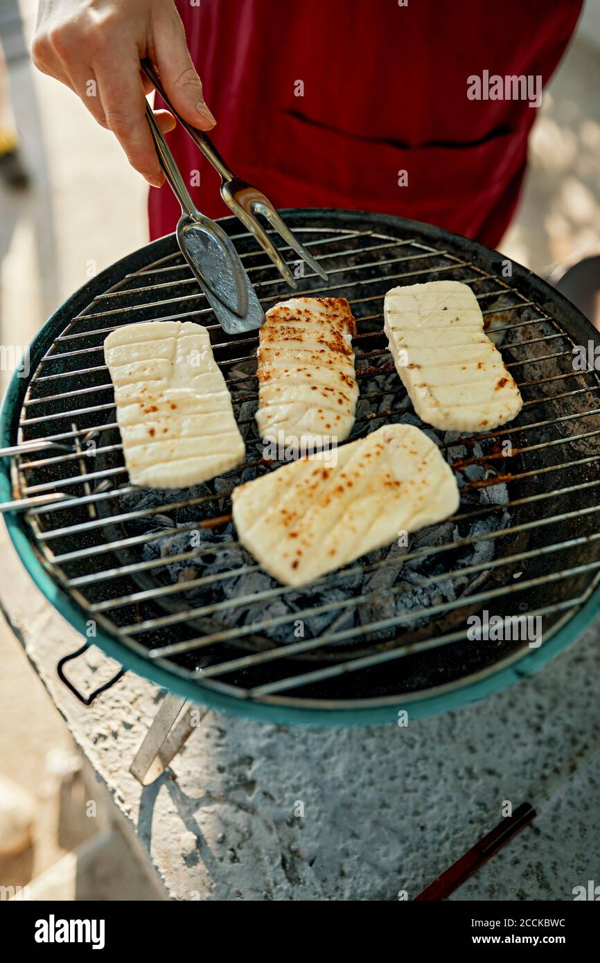 Halloumi cheese on barbecue grill Stock Photo Alamy