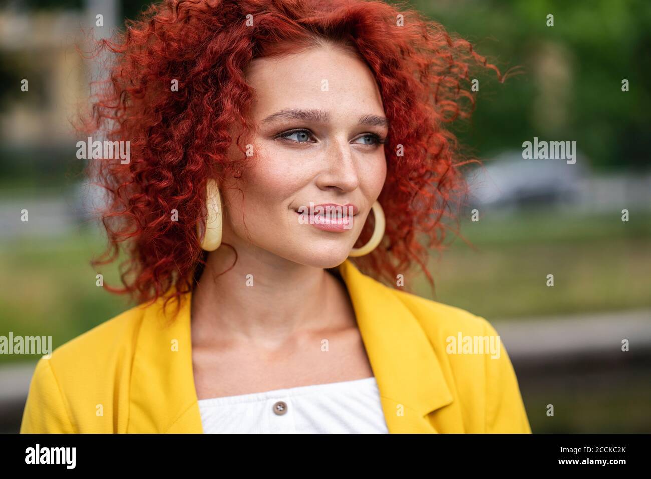 Beatiful woman with red curly hair, portrait Stock Photo