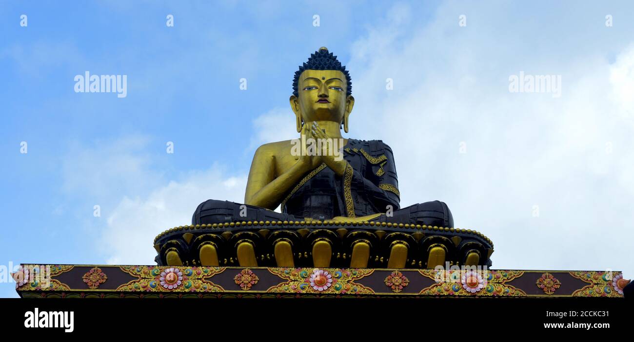 Big golden Buddha statue on Himalayan mountains of Sikkim in Ravangla Park of Gangtok, selective