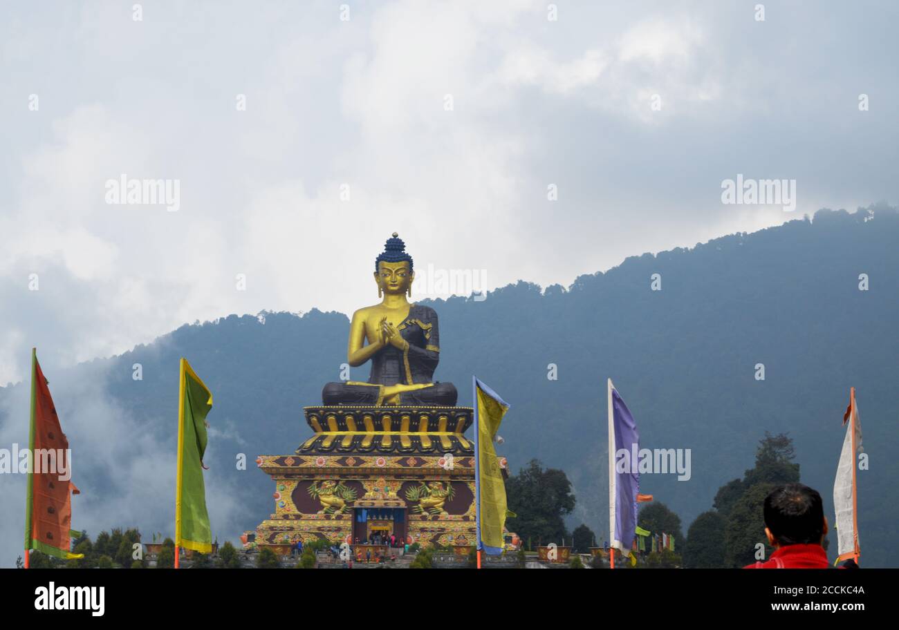 Big golden Buddha statue on Himalayan mountains of Sikkim in Ravangla Park of Gangtok, selective