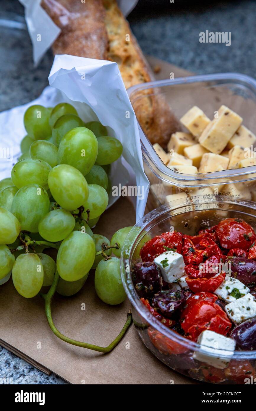 Grapes, cheese cubes and salad with tofu Stock Photo Alamy