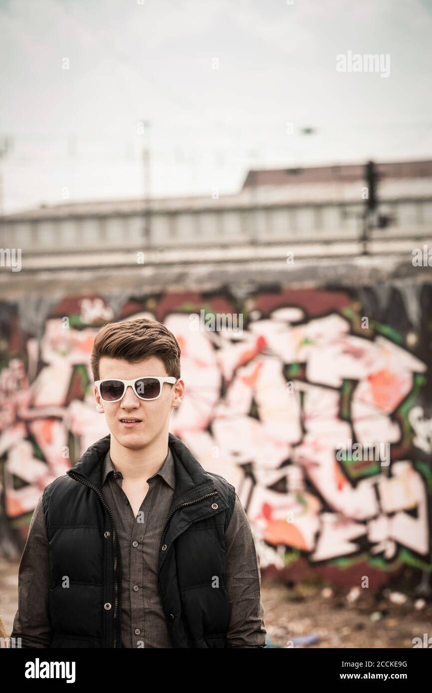 Teenage boy wearing sunglasses hi-res stock photography and images