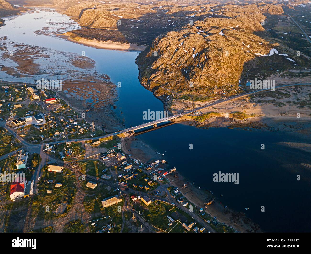 Russia, Murmansk Oblast, Teriberka, Aerial view of village on shore of