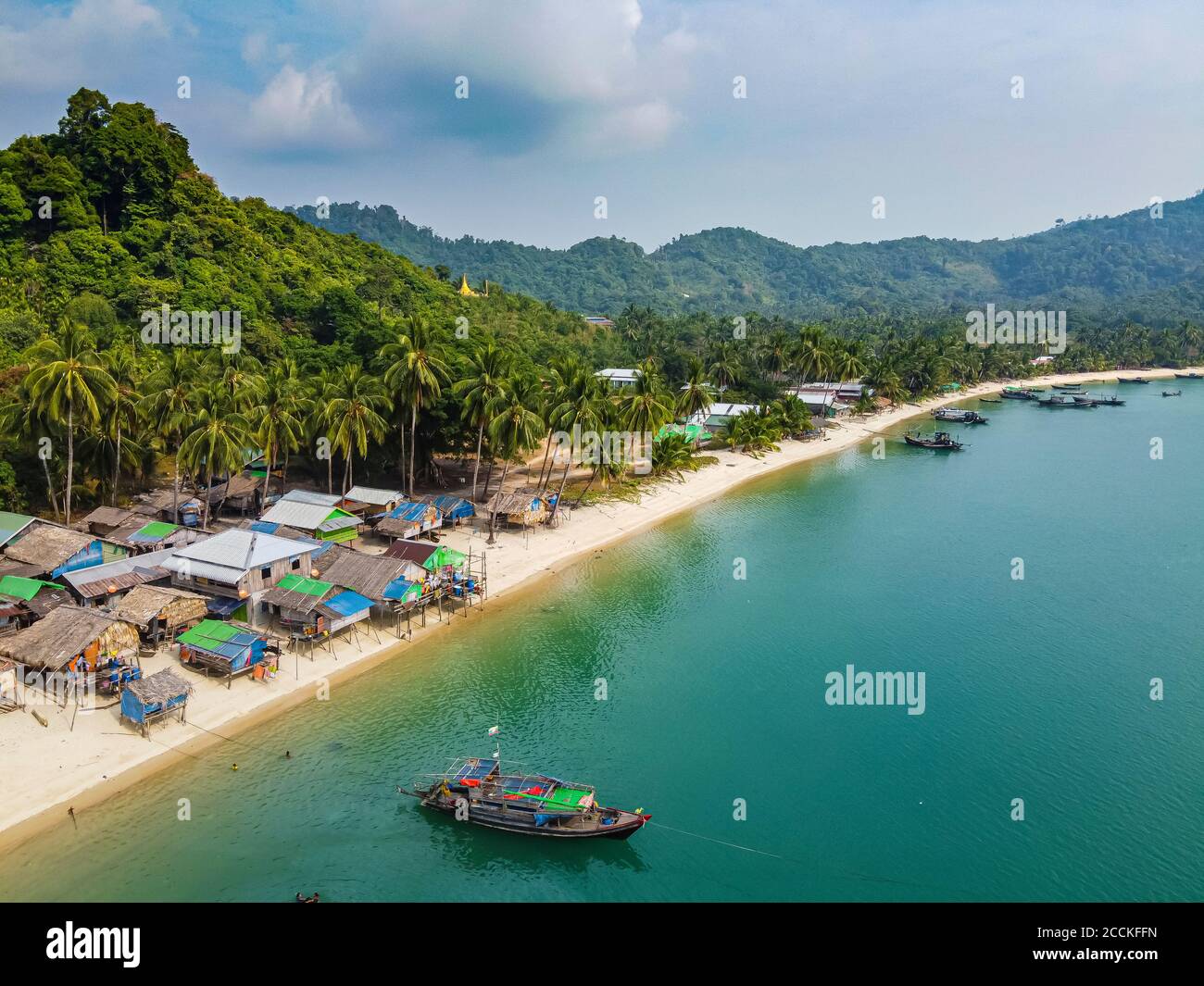 Myanmar, Mergui or Myeik Archipelago, Moken, sea Gypsy village on sandy beach, aerial view Stock Photo