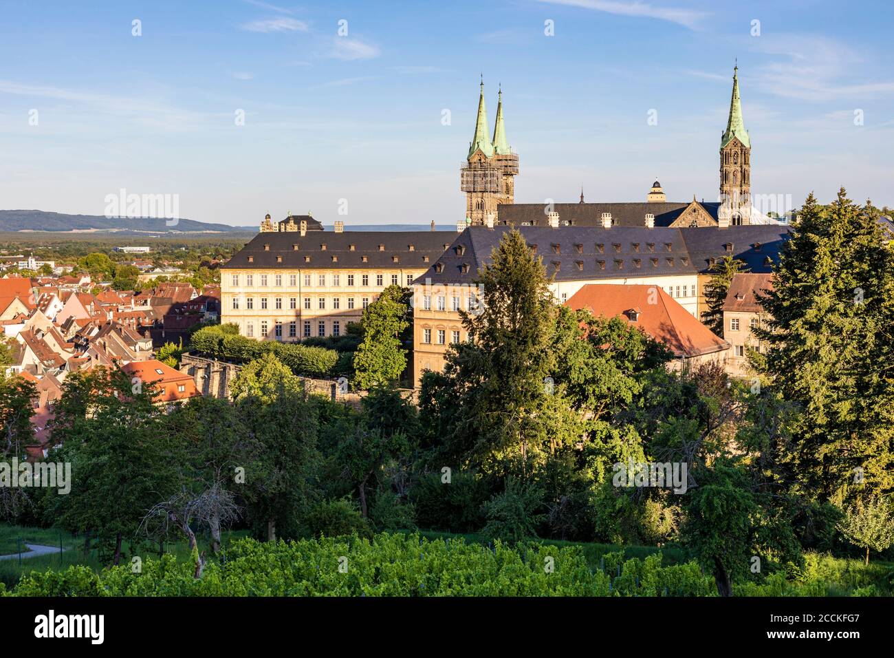 Germany, Bavaria, Bamberg, Bamberg Cathedral and surrounding old town buildings at dusk Stock Photo