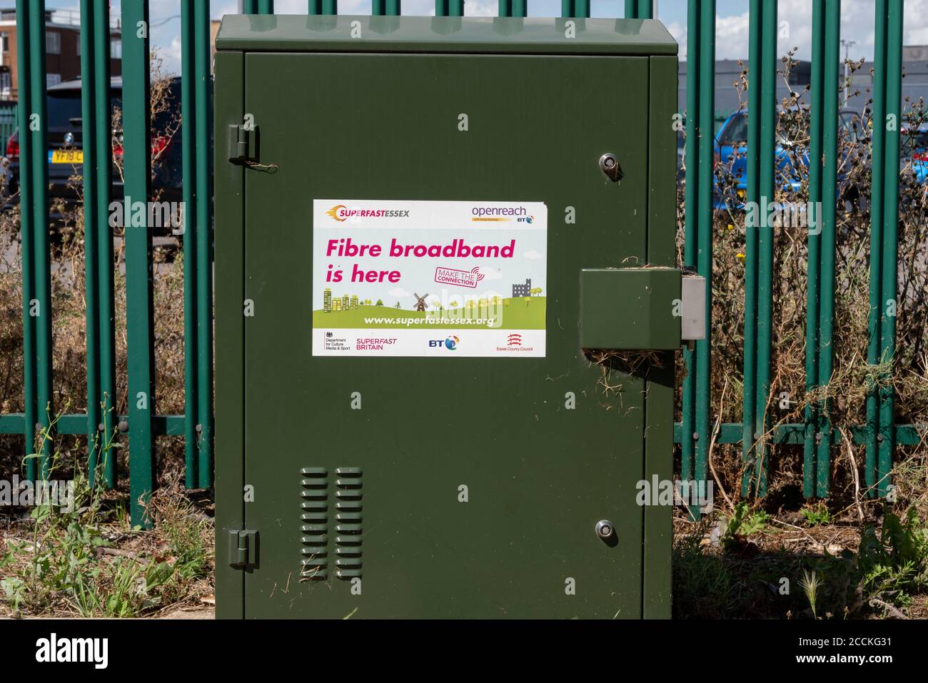 Fibre broadband notice sign on junction box. Superfast Essex. Openreach BT. Superfast Britain. Essex County Council. DCMS. Communications Stock Photo