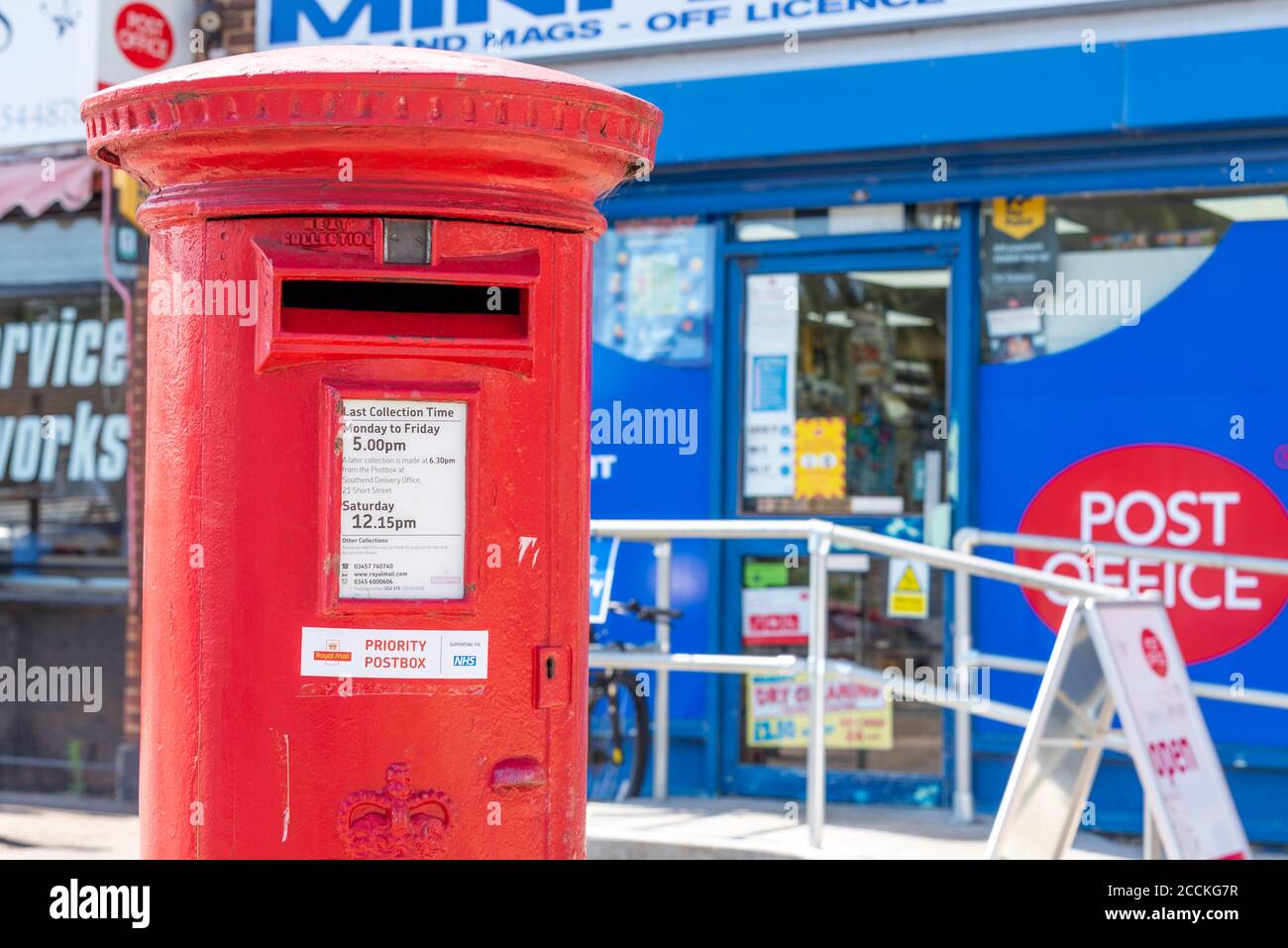 Priority post box, sign, outside a Post Office in Southend on Sea, Essex, UK, during COVID-19 Coronavirus pandemic lockdown. Mail box, letter box Stock Photo