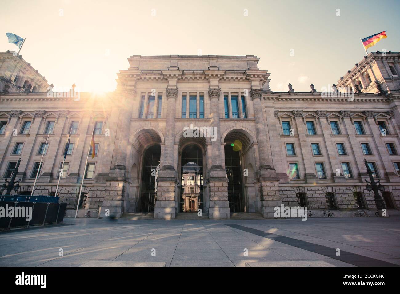 Germany, Berlin, Sun setting over back entrance of Reichstag Stock Photo