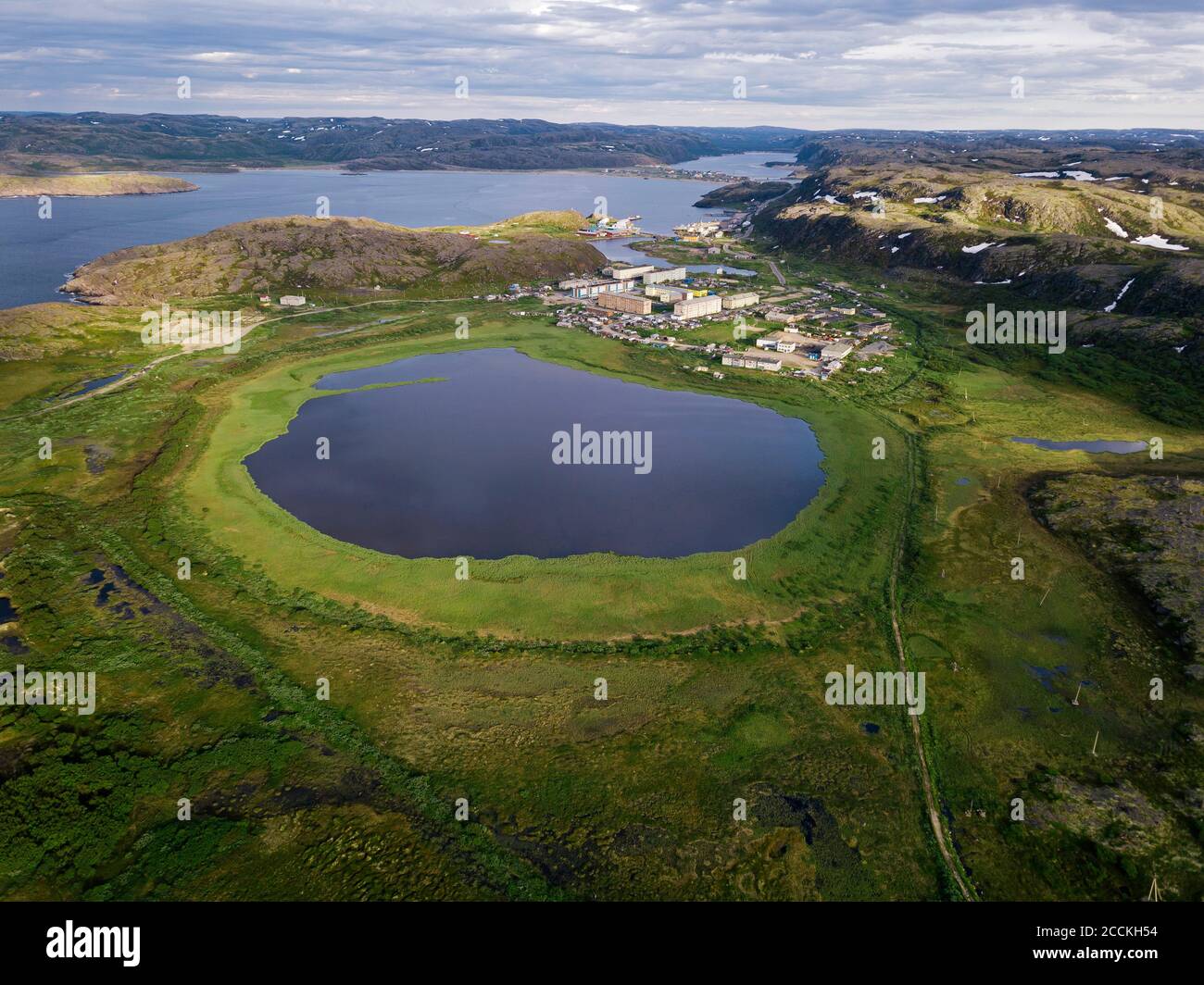 Russia, Murmansk Oblast, Teriberka, Aerial view of lakeside village