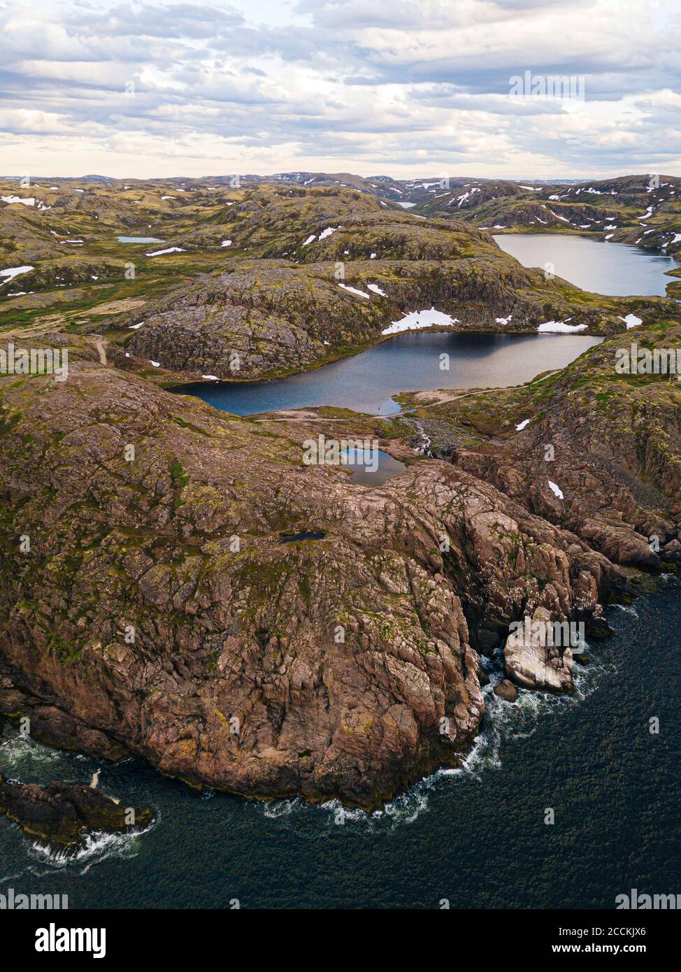 Russia, Murmansk Oblast, Teriberka, Aerial view of rocky coastal