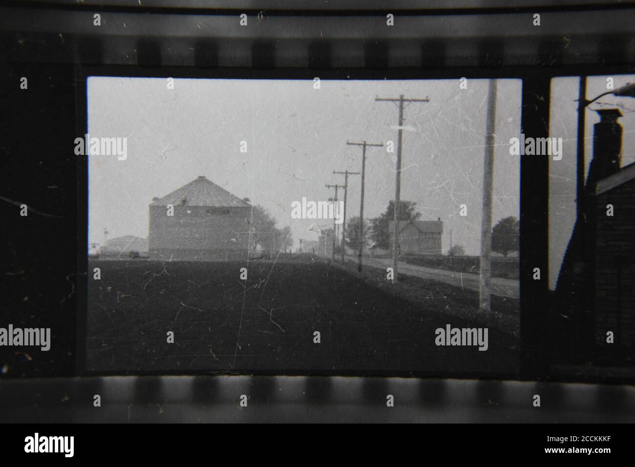 Fine 1970s vintage black and white photography of a small town sitting ...