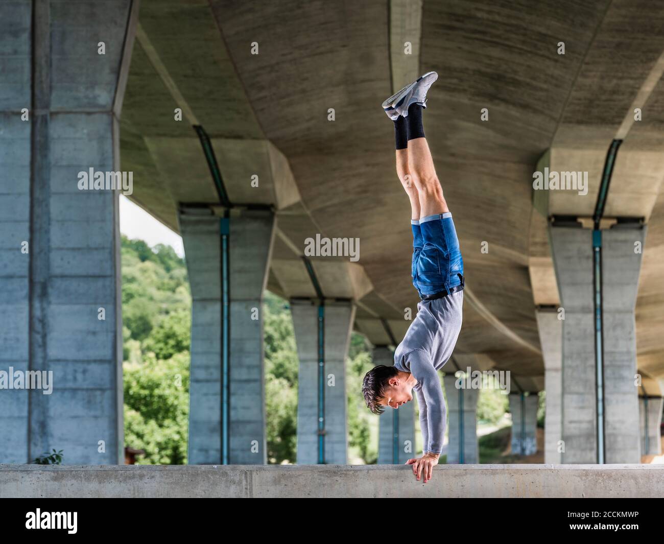 Young man doing acrobatics Stock Photo