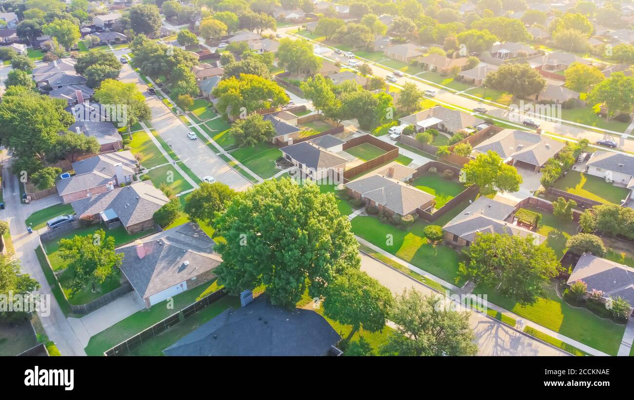 Bird eye view clean and peaceful neighborhood streets with row of