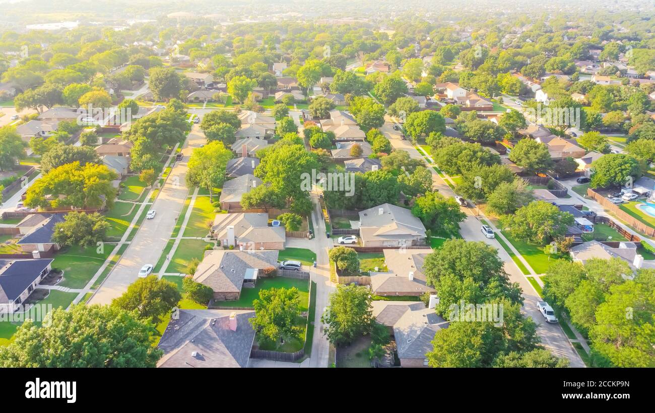 Bird eye view clean and peaceful neighborhood streets with row of