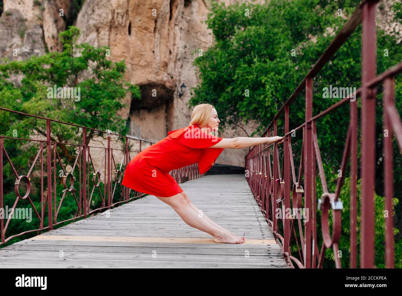 Female looking over bridge hi-res stock photography and images - Alamy