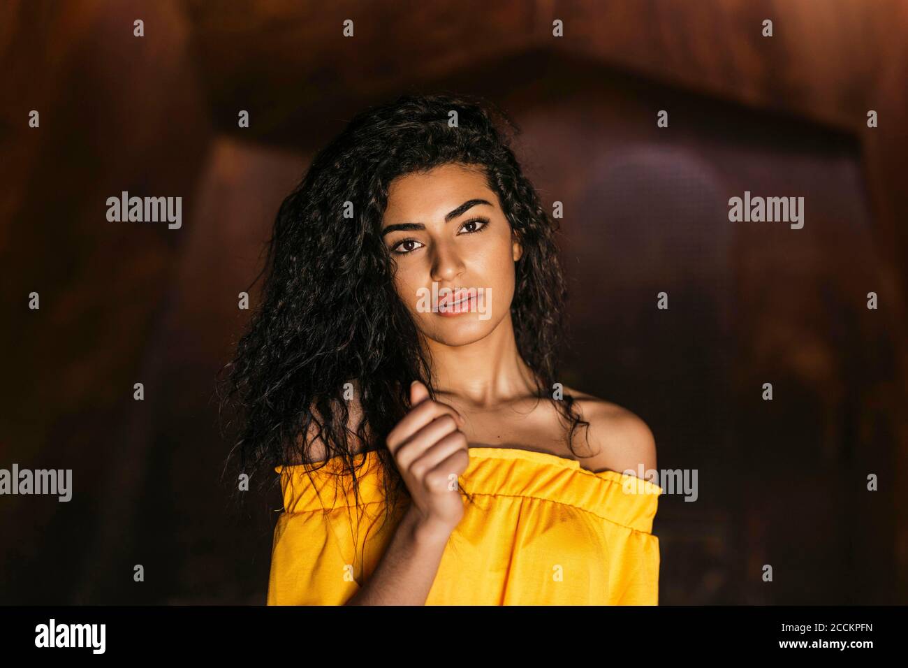 Portrait of young black-haired woman Stock Photo