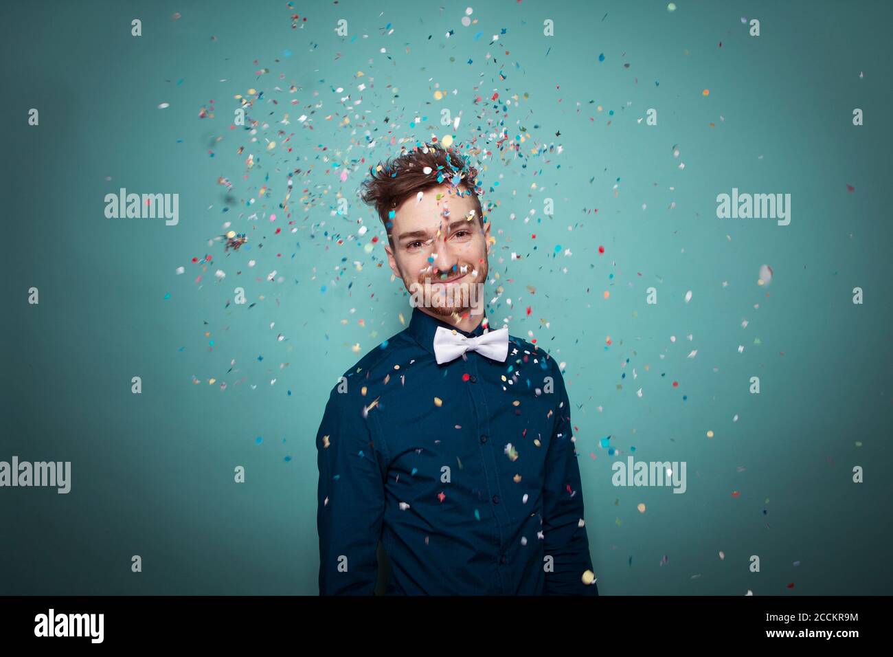 Man throwing confetti hires stock photography and images Alamy
