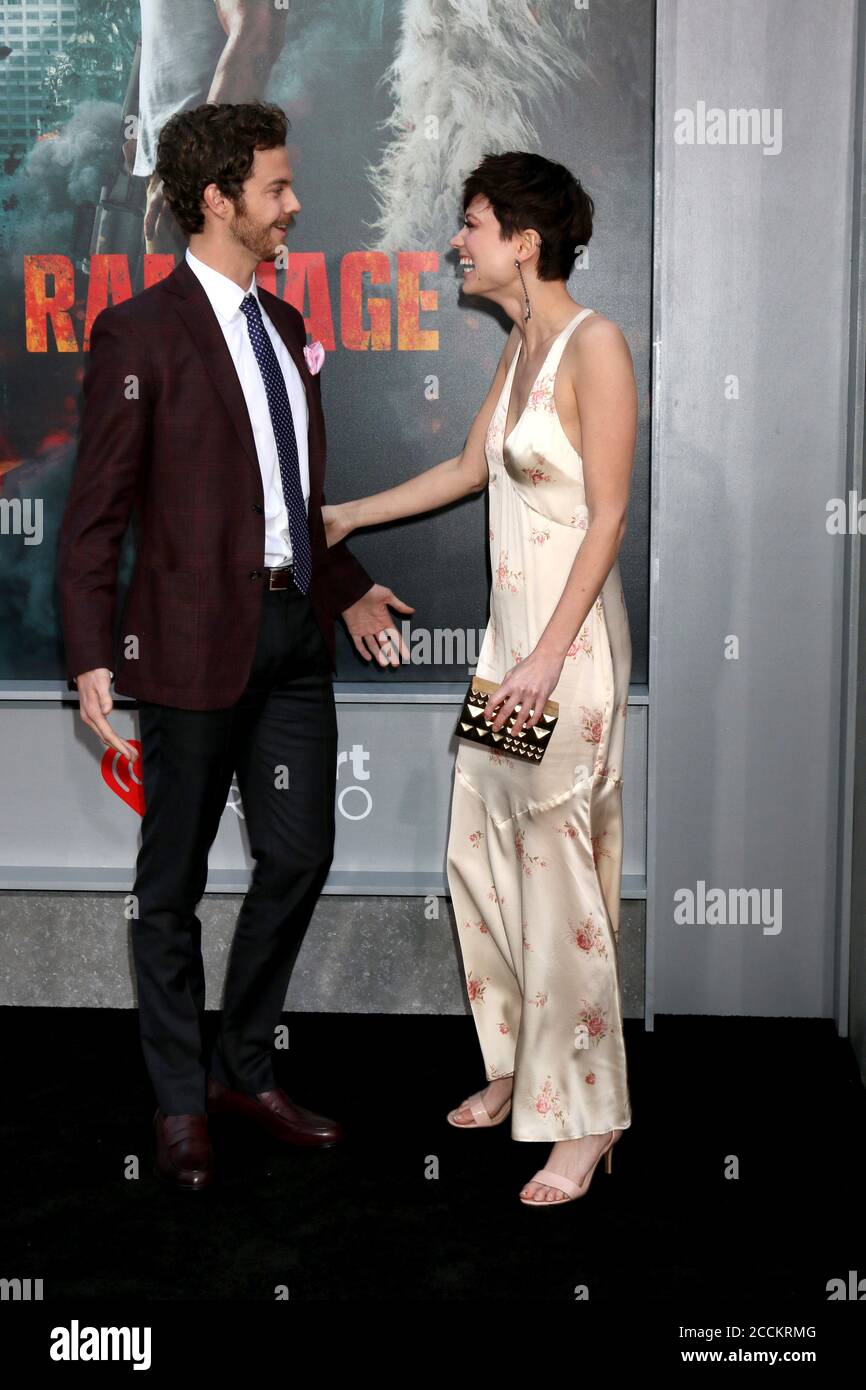 LOS ANGELES - APR 4:  Jack Quaid, Lizzy McGroder at the Rampage Premiere at Microsoft Theater on April 4, 2018 in Los Angeles, CA Stock Photo