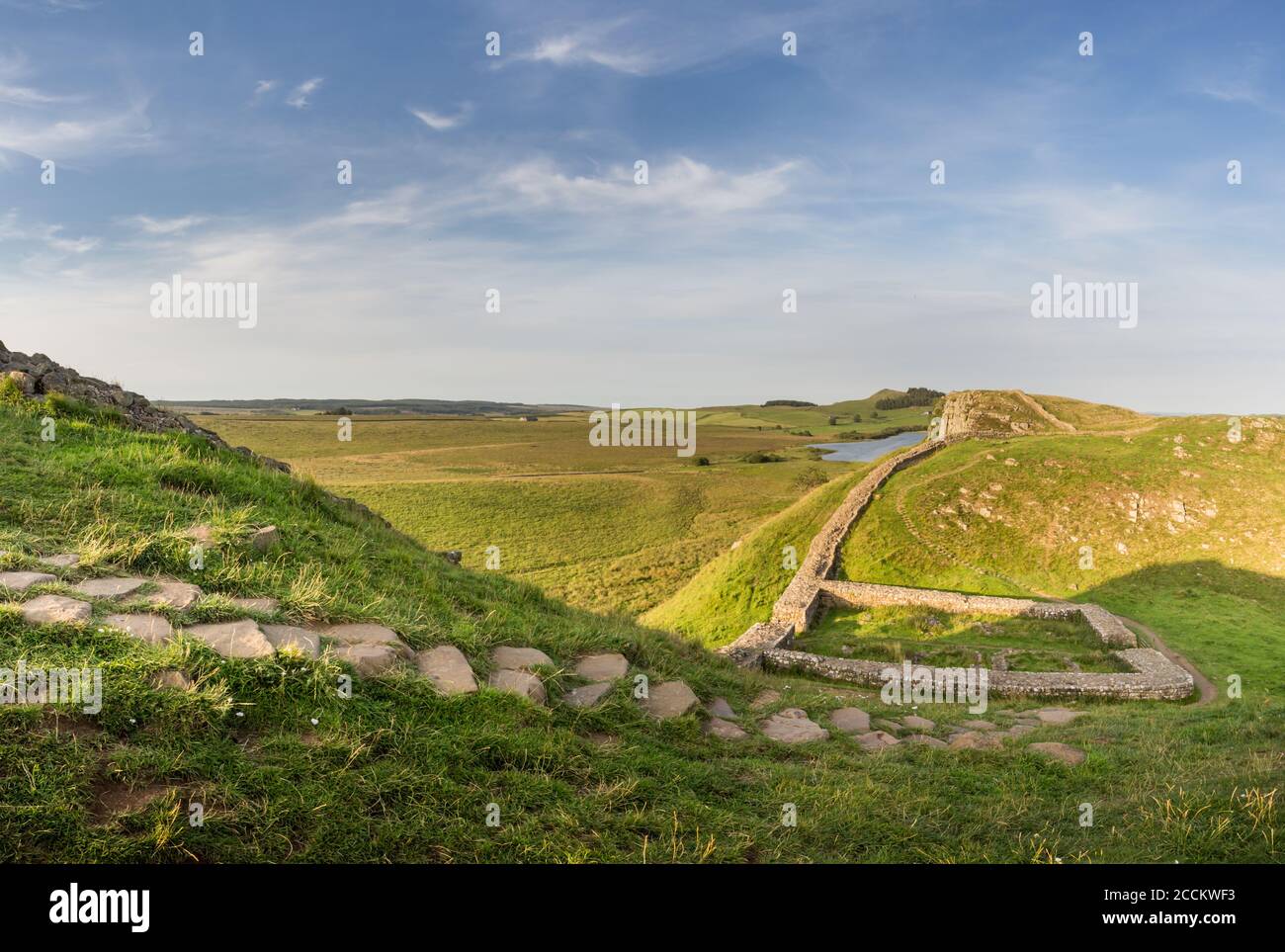 Milecastle 39 on Hadrian's Wall ancient historic monument from Roman times near Sycamore Gap, Northumberland on a sunny evening in summer time. Stock Photo
