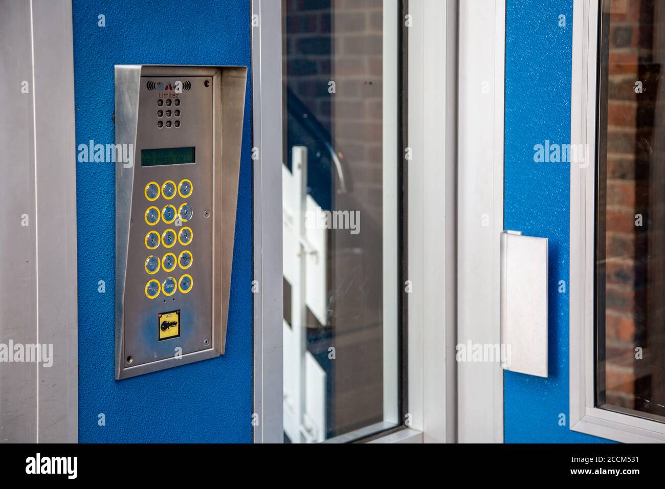 A intercom system on the exterior of a block of flats used for gaining access Stock Photo