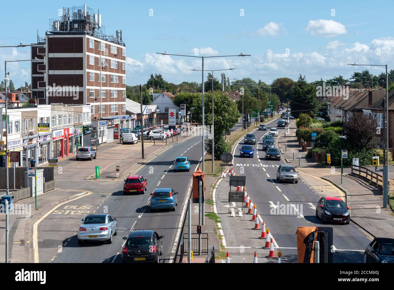 The Bell road junction of the A127 Prince Avenue with Hobleythick Lane, soon to be the site of a lengthy redesign and roadworks. Lane closure. Shops Stock Photo