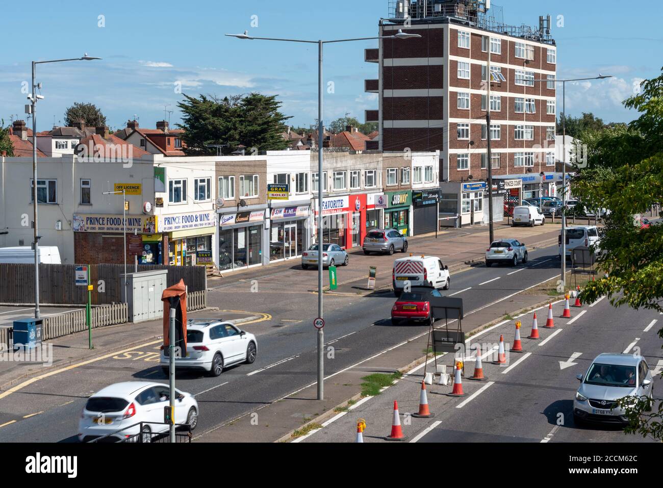 The Bell road junction of the A127 Prince Avenue with Hobleythick Lane, soon to be the site of a lengthy redesign and roadworks. Shops and flats Stock Photo