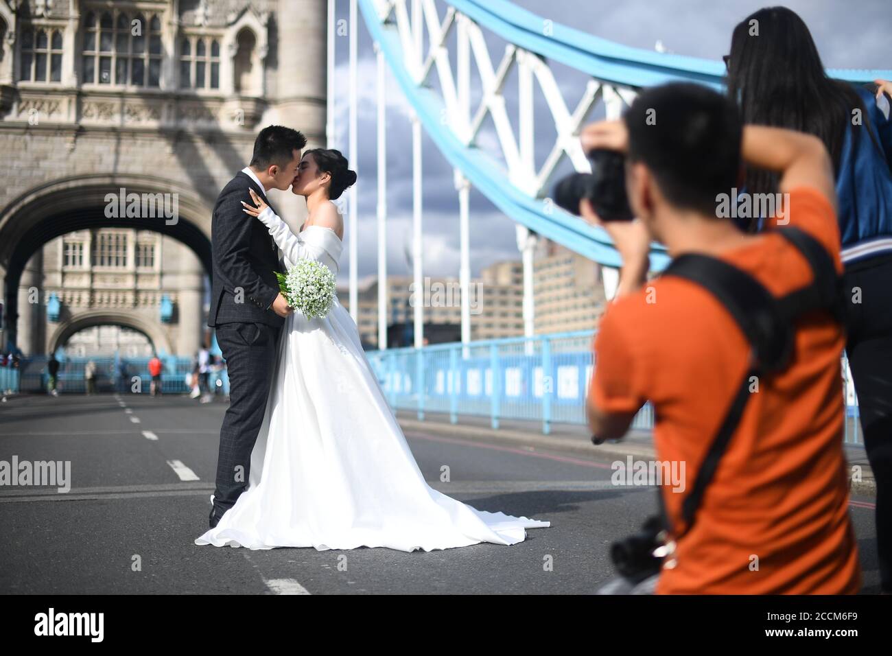 Jenny Nguyen And Tony Cao From Vietnam Pose For Wedding Photos On Tower Bridge London As It Remains Closed To Vehicles After It Was Stuck Open For More Than An Hour On