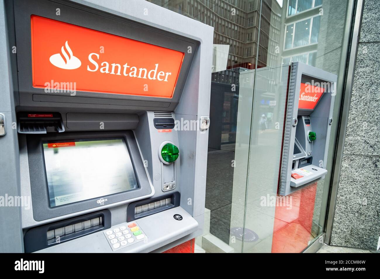 LONDON- Santander cash machine on west London branch- a British bank owned by the Spanish Santander Group Stock Photo